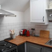 Modern open-plan kitchen in The Hayloft